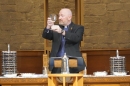 Rev Fergus Cook with the Communion wine symbolising the blood of Christ