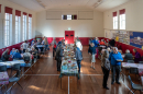 Everyone enjoying the Harvest lunch after the service