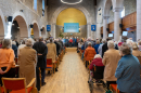 A busy sanctuary as the congregation enjoys the music of the Praise Band and Group