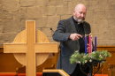 Rev Fergus Cook lights the 3rd Advent Candle