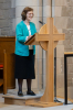 Elizabeth Baird reads the lesson from the Bible