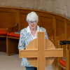 Muriel Stenhouse reads the lesson from the Bible